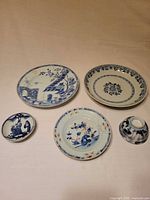 Overall view of five porcelain pieces