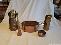 Group shot of all five copper items