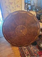 Full view of round marquetry tabletop