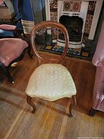 Full view of chair front showing frame and upholstery