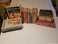 Group shot showing all 21 hardcover books in three groupings