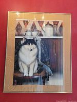 Full view of framed watercolour cat painting