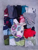 Top-down view of entire folded clothing bundle
