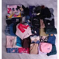 All 30 folded garments laid out