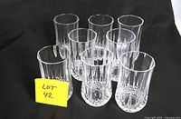 All eight Crystal d’Arques tumblers grouped, front angle