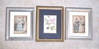 Front view of three framed prints side by side