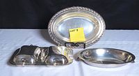 All three silverplate serving pieces displayed together
