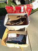 boxed light set, plastic tote with twig stable