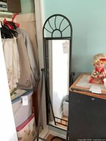 Full view of mirror showing frame and stand