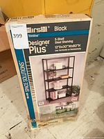 Front of boxed Hirsh Designer Plus steel shelving unit