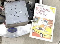 Ford radio next to Chilton manual