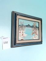 Full view of framed painting on wall