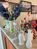 Countertop view showing all vases, figurines and holiday arrangement