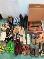 All 15 pairs displayed in three rows on floor