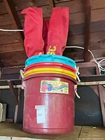 Red Maxi-Tub bucket with three coloured lids visible