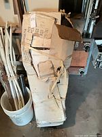 Damaged cardboard box containing Christmas tree