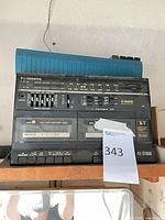 Front view of Panasonic RX-CT800 showing dual cassette decks, equalizer, CD lid