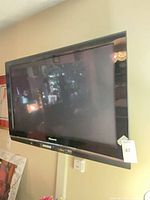 Front view of wall-mounted Panasonic plasma TV