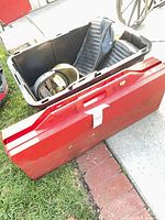 Closed red folding table carry case