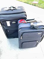 Both suitcases front view showing size and style