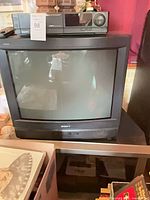 Sony CRT TV with VCR on top and stand below