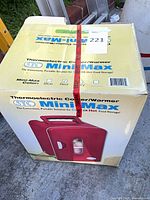 Front of sealed retail box showing product image and branding