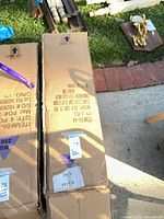 Two sealed USC cartons of folding chairs