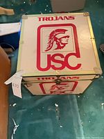 Top view showing USC Trojans logo and corner hardware