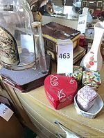 Overall lot showing Chivas decanter, heart box, tins, vase and small items
