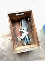 crate interior with visible tools