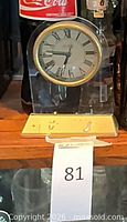 Acrylic desk clock with Roman numeral dial