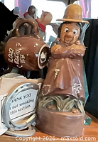 Southwestern figurine, pirate jug partially visible