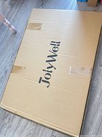 Sealed JoyWell cardboard shipping box