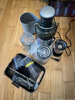 All items grouped: juicer, Magic Bullet base, cups, parts