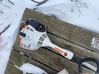 Engine housing showing Stihl branding and controls