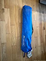 Blue Lightspeed Outdoors zip carry bag containing tent