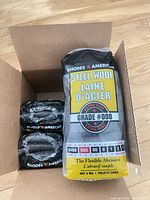 Open box with sealed packs showing front label grade 000