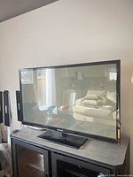 Front view of Samsung 51-inch plasma TV on stand