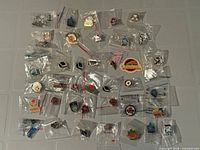 All 38 pins laid out in sleeves