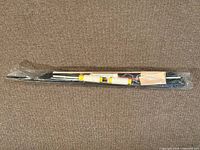 Kit sealed in original clear sleeve showing contents