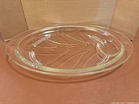 Top view of clear oval Pyrex tray showing wave pattern