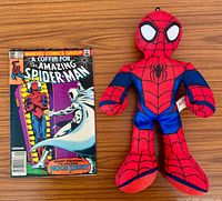 Front cover of The Amazing Spider-Man #220 and Spider-Man plush side by side