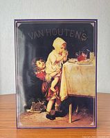 Front view of Van Houten's Cocoa tin sign upright