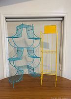 Front view of both metal stands on table