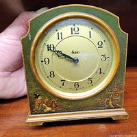 Front view of Smiths SEC mantel clock showing dial and chinoiserie scene