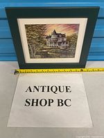 Full framed print with tape measure for scale