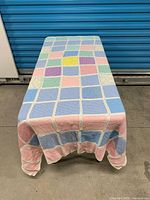 Blanket draped over table full view