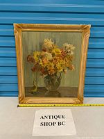 Frontal view of entire framed painting with measuring tape