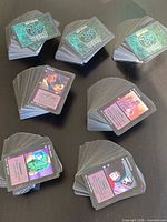 Six stacks of Jyhad cards with several face-up examples