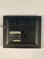 Rear view of Kodak EasyShare S510 frame showing label and vents